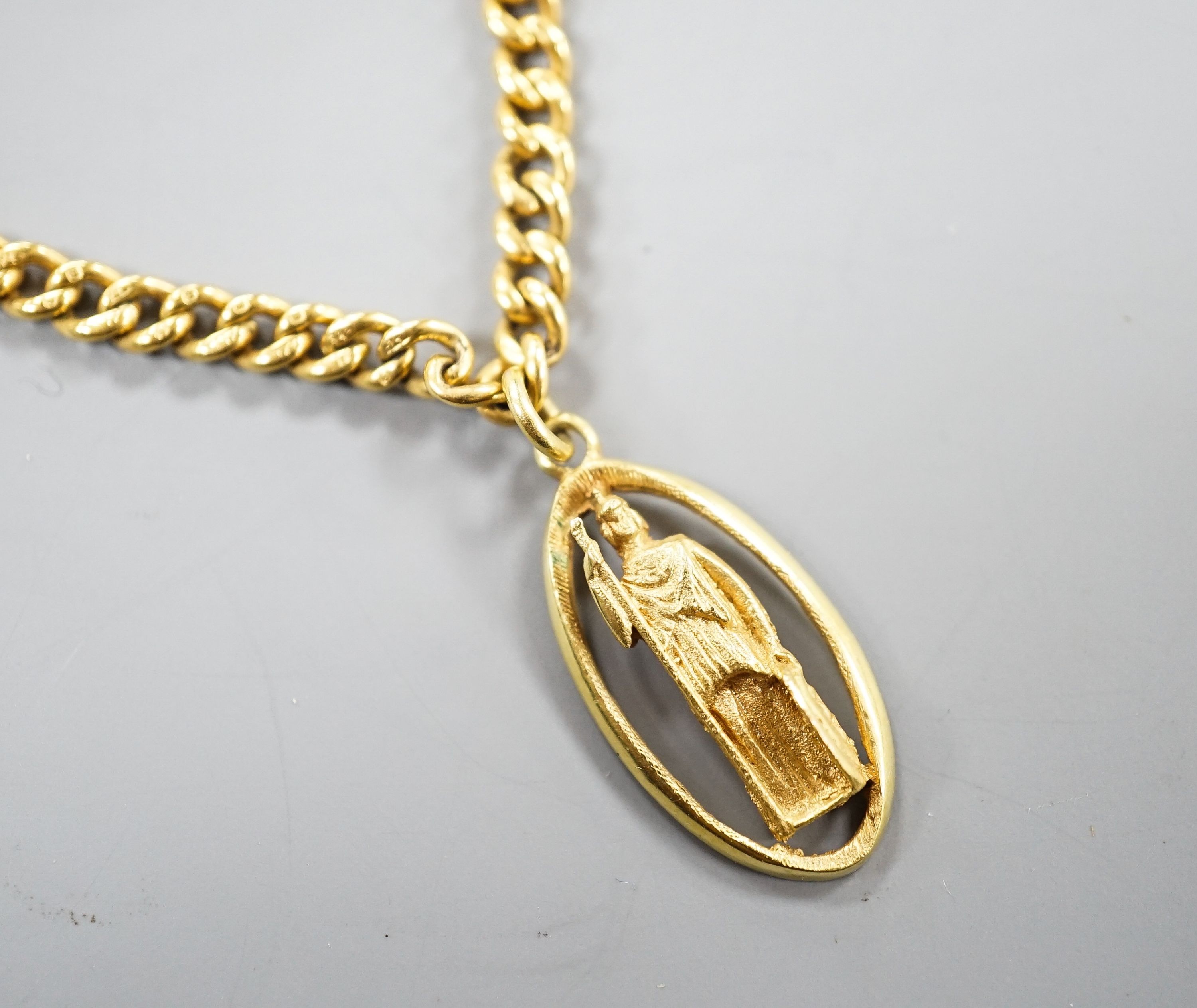 A 9ct curb link chain, 44cm, 15.7 grams, with a yellow metal St. Christopher pendant, engraved '18', 2.5 grams.